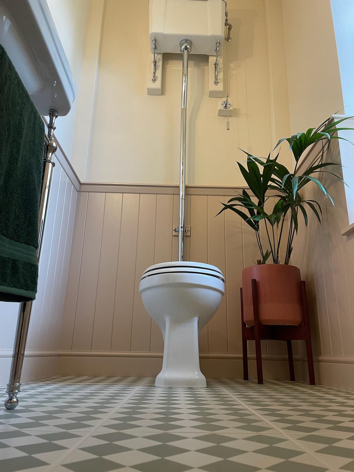Bathroom with a high-level cistern