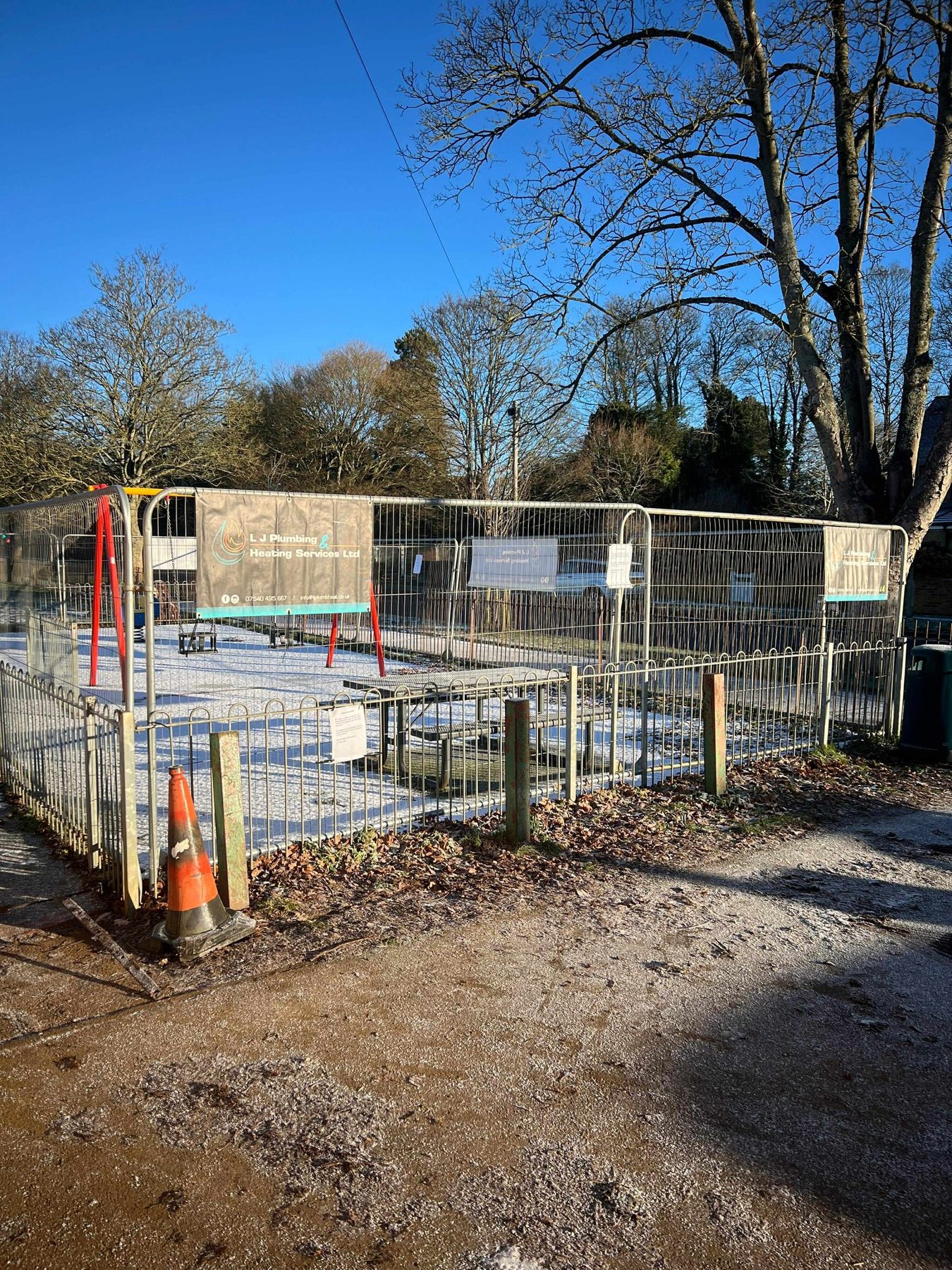 The fenced playground site at Bodicote Village Hall