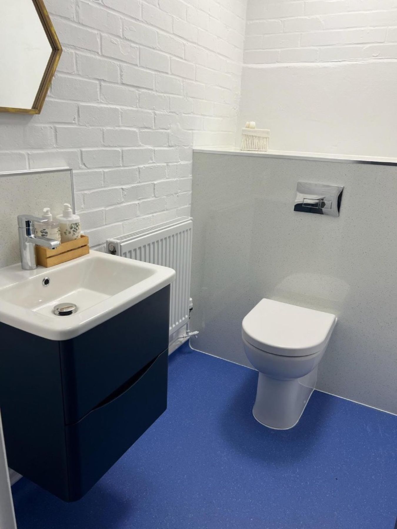 Refurbished staff WC with concealed cistern and new vanity