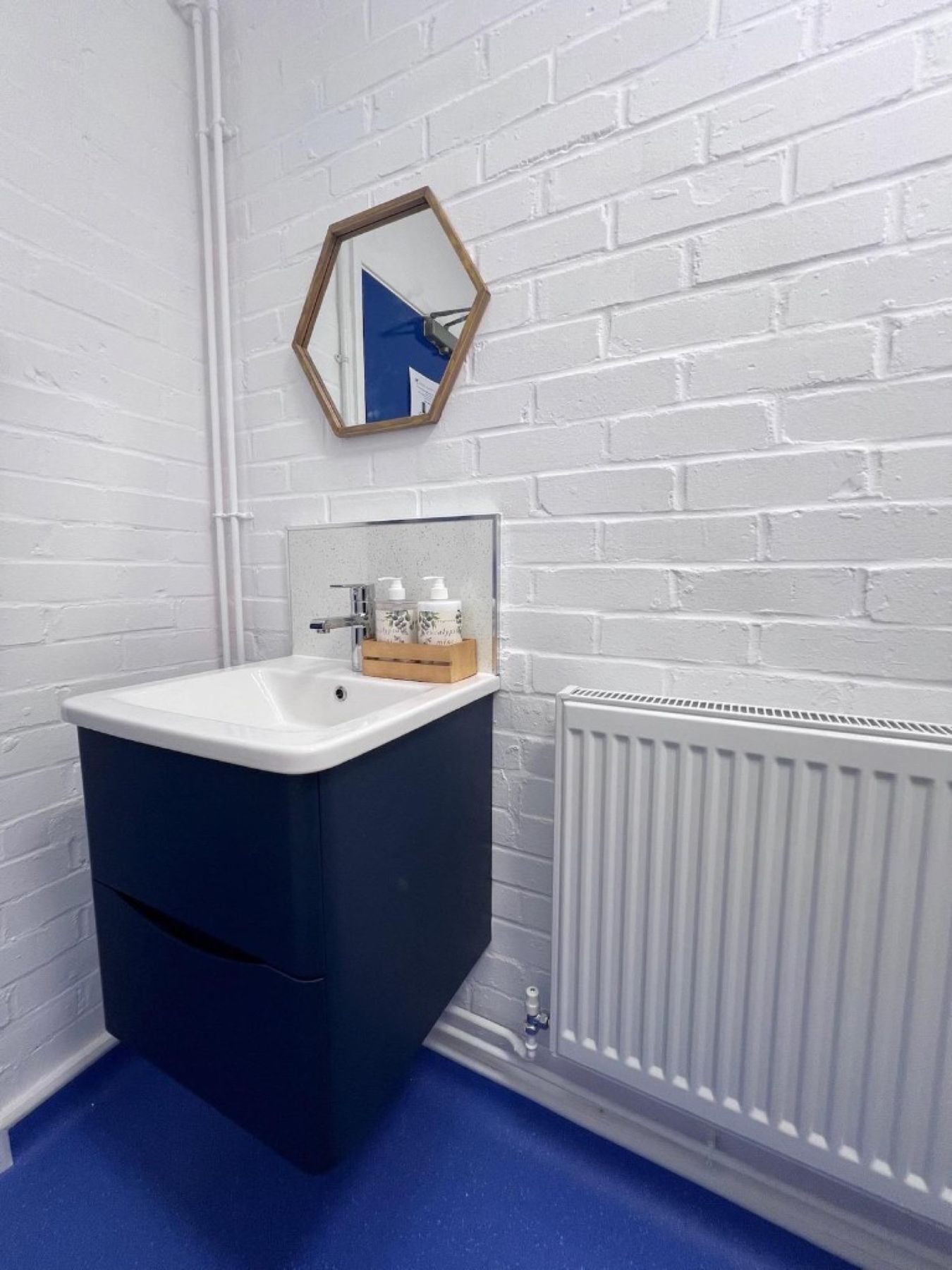 Staff vanity, basin and upgraded heating